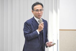 日本貿易会で新村が講演しました。